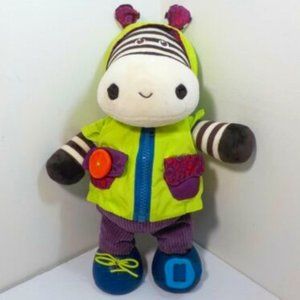 B. You Interactive Giggly Zippity Zebra, Learn to Dress Plush, By CUCU Toys